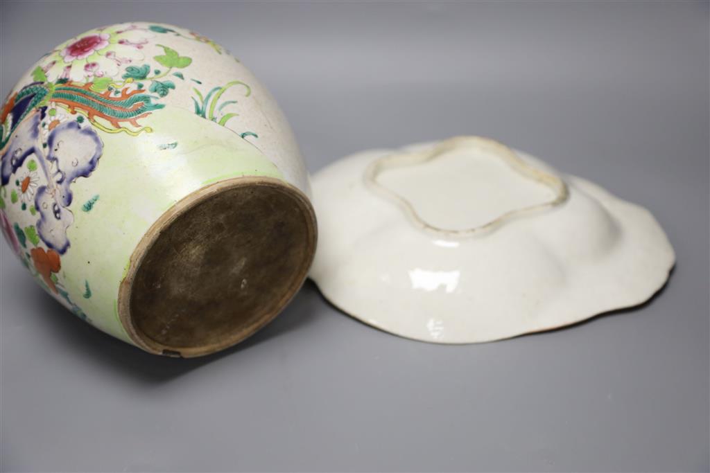 A Chinese famille rose jar and dish, length 28cm